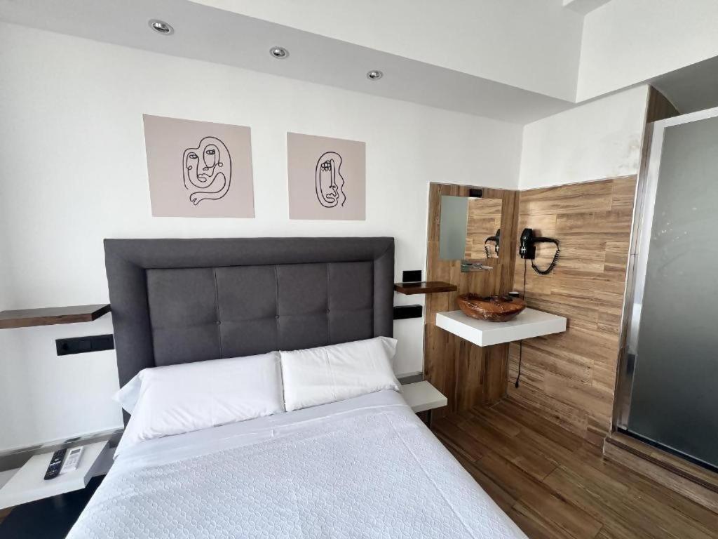Ilustre Rooms Malaga Phòng bức ảnh